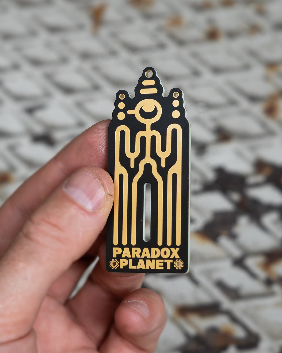 paradox planet keychain